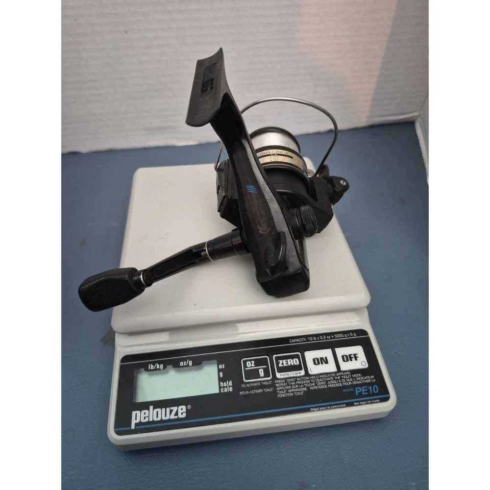 Daiwa AG1305X LONG CAST SPOOL X FISHING REEL SPINNING REEL W AUTOCAST VGUC